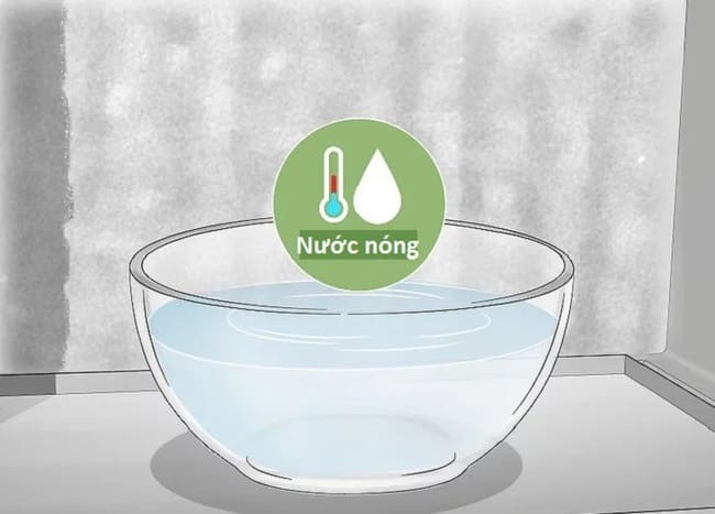 Để tuyết tan tự nhiên hoặc dùng nước nóng để tăng tốc độ tan